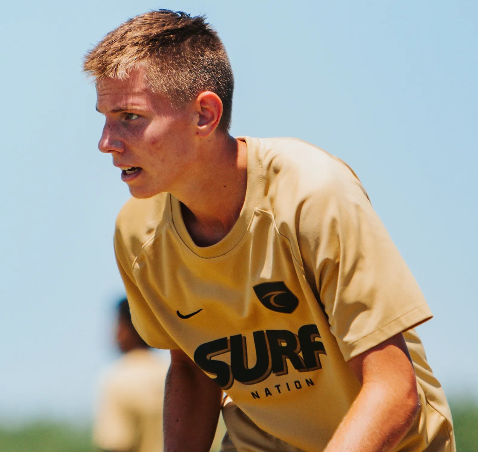 South Valley Surf boys player in a Surf jersey locked in during a match